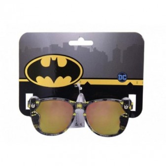 Occhiali da sole Batman bambino con montatura decorata e lenti sfumate specchiate, confezione originale con logo DC Comics e Batman.